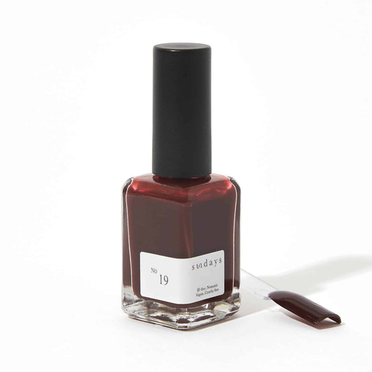 Non-toxic nail polish in dark red